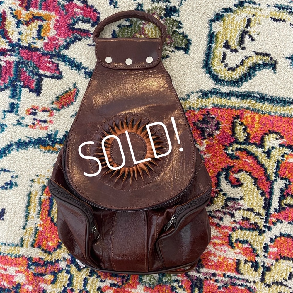 Vintage leather backpack/sling bag